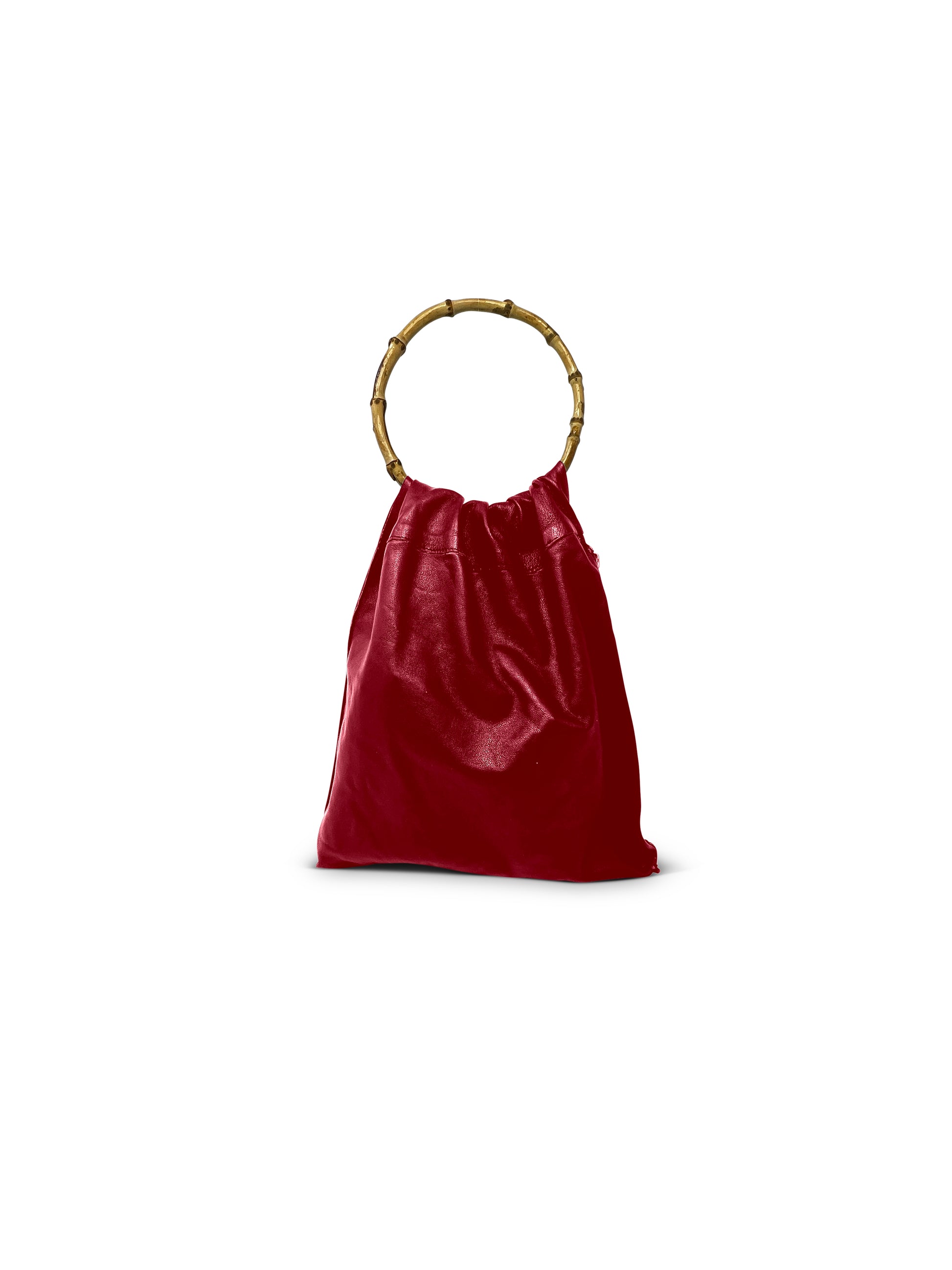Red leather bag with a round natural bamboi handle & side zipper. Made in Los Angeles
