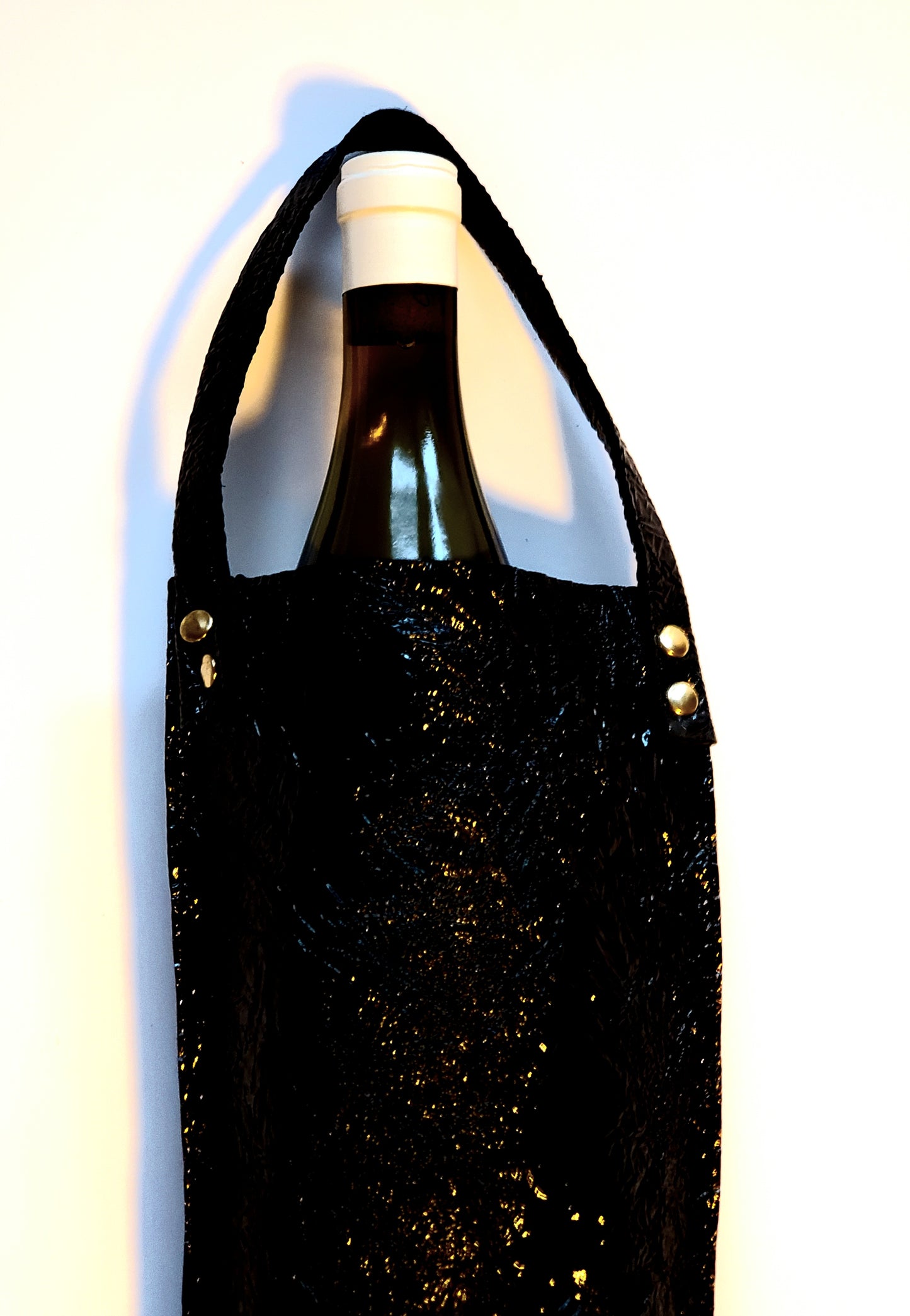 Bkack bottle bag with wine inside. Made in LA