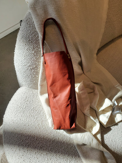Rust leather bottle bag made in LA