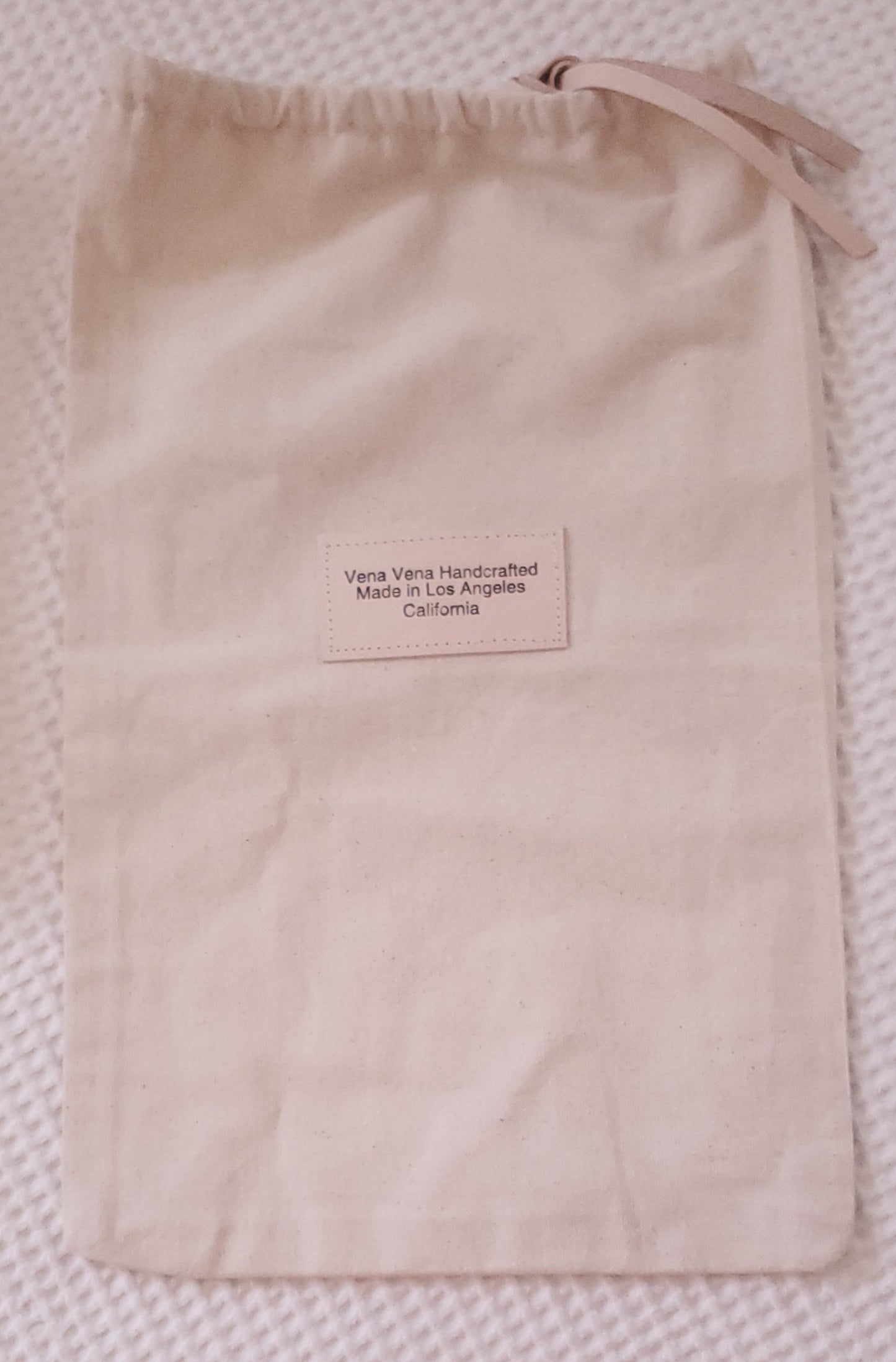 Canvas shoe bag with leather closure. Made in Los Angeles California 