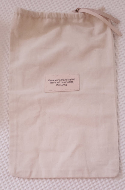 Canvas shoe bag with leather closure. Made in Los Angeles California 