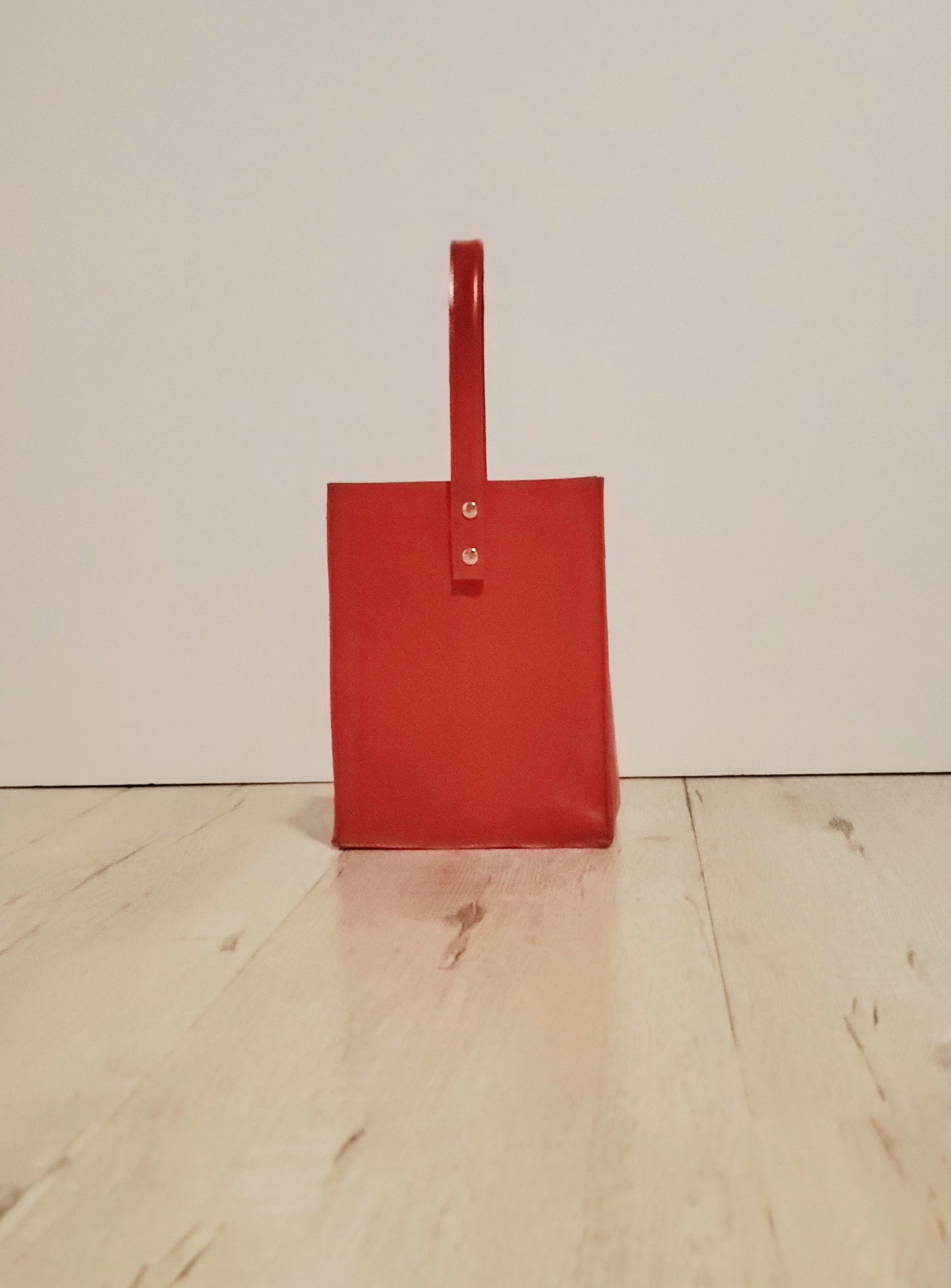 Red leather square bag with one handle