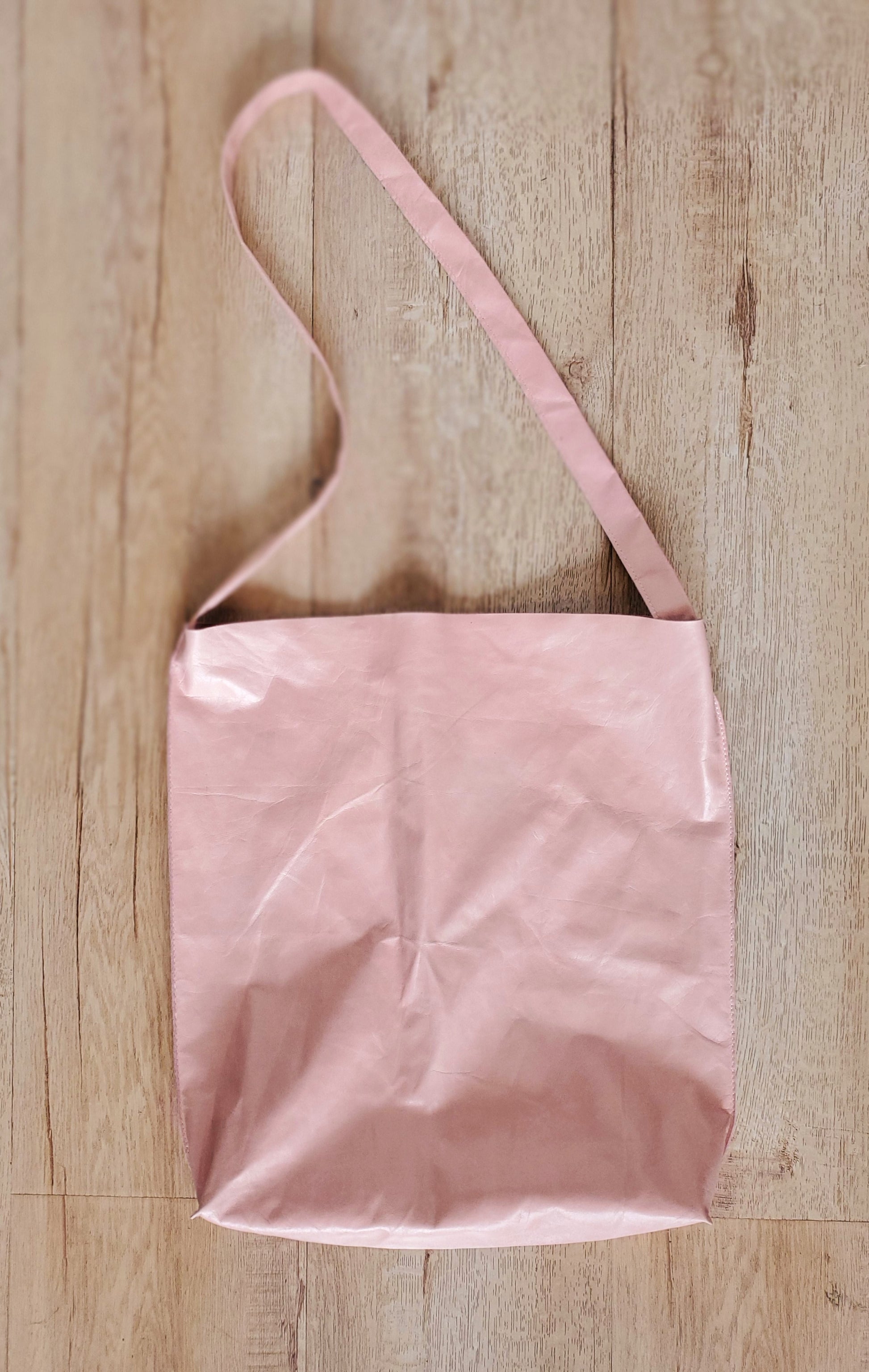 Pink leather hobo bag with one handle & 2 inside pockets