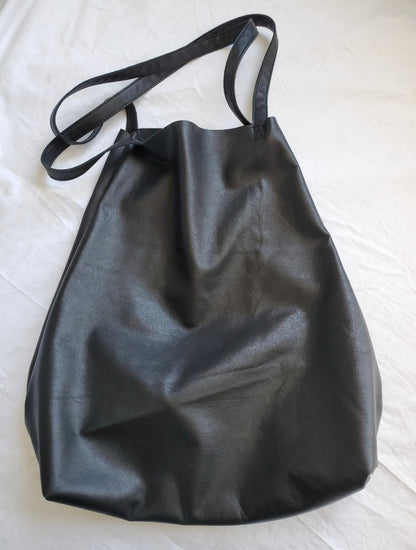 Black leather tote bag with 2 inside pockets. Made in Los Angeles