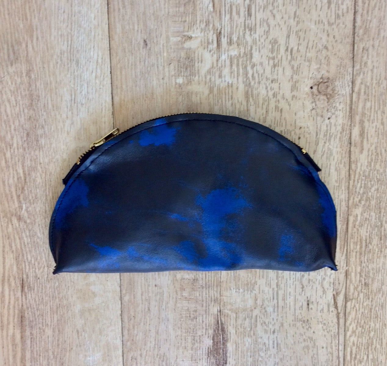 Royal blue & black lamb skin make up bag with gold metal zipper